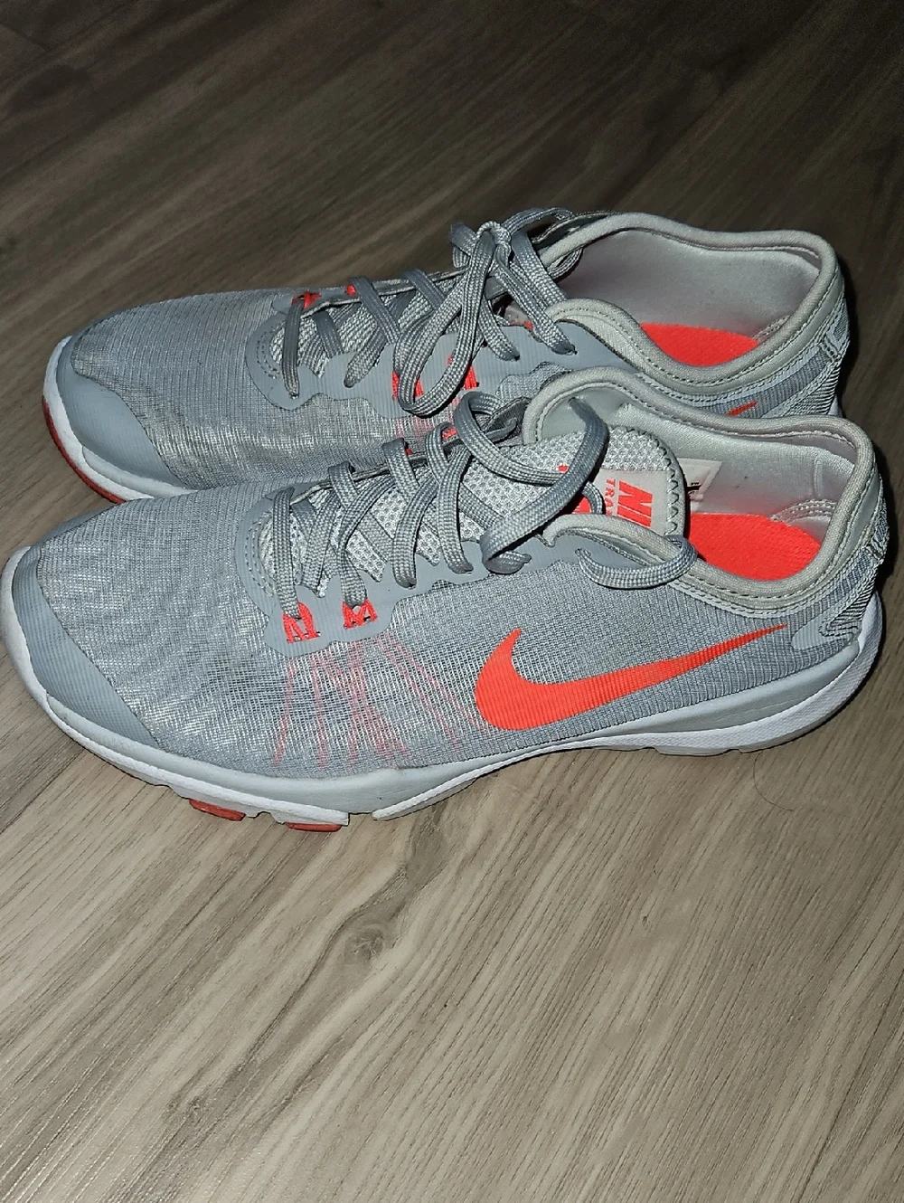 Nike Light Gray Running Shoes with Bright Orange Swoosh - Picture 1 of 5